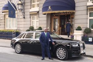 Comparing the costs of a Rolls Royce chauffeur service to traditional taxi or ride-sharing services.